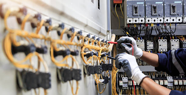Professional Electrician technician working in Stowell, TX